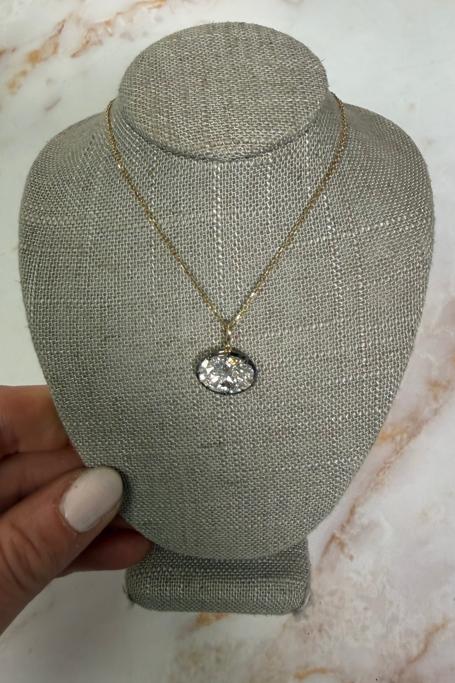 4 ct east west black rhodium set oval solitaire necklace
