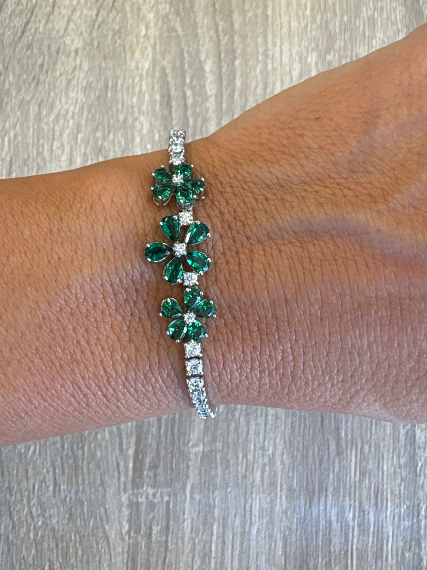 2.88 cttw tennis bracelet with emerald green flowers