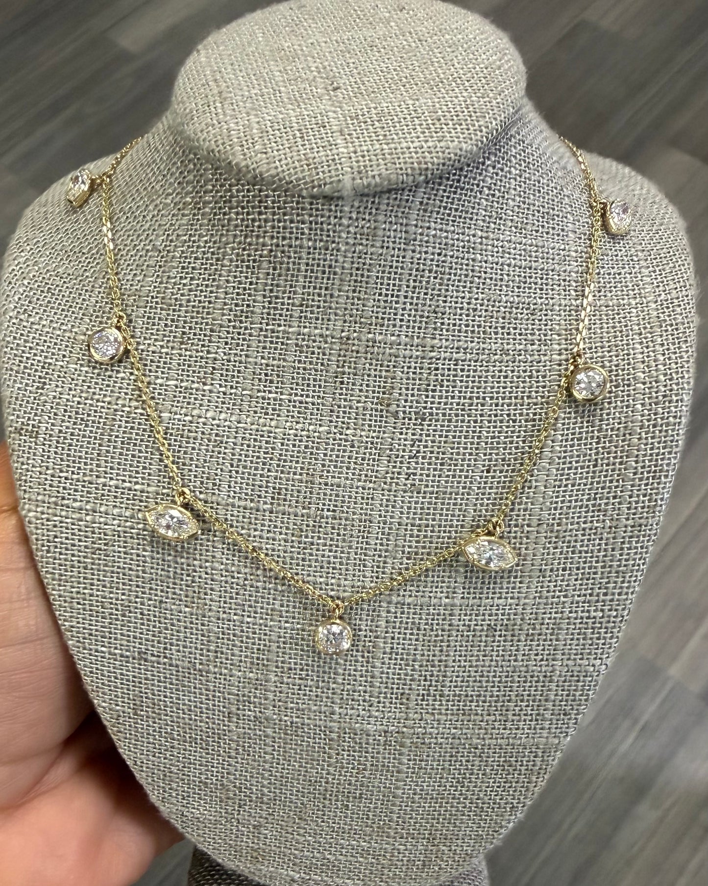 2.11 cttw yellow gold necklace with hanging bezel Marquis and rounds