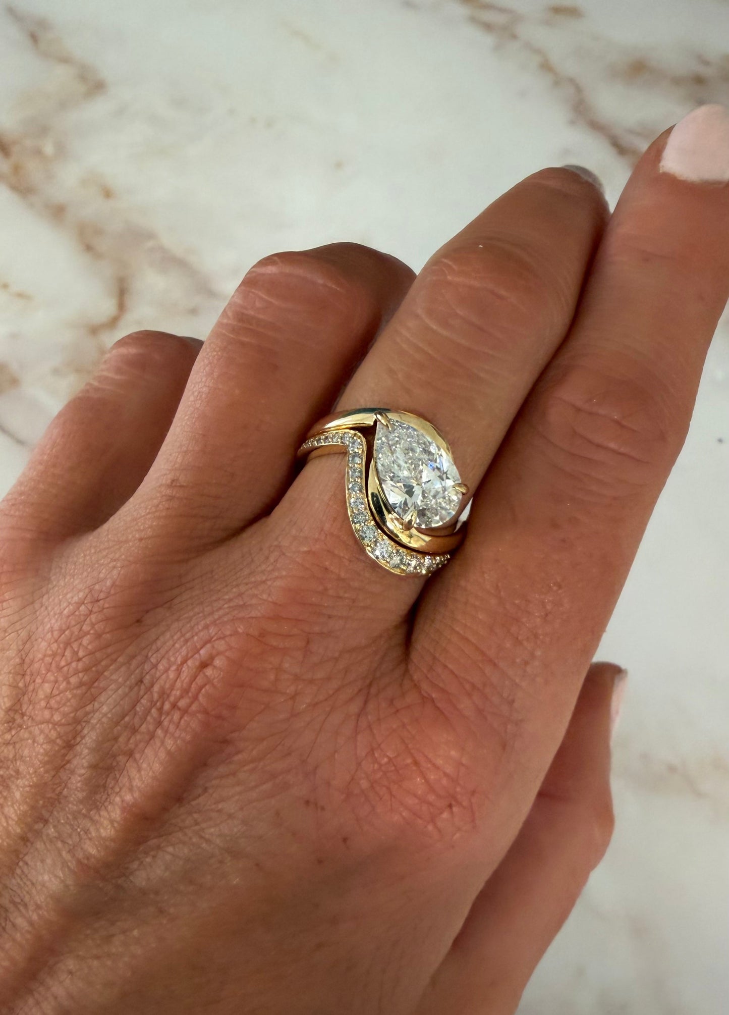 2.88 cttw pear on wavy band + wavy pave band
