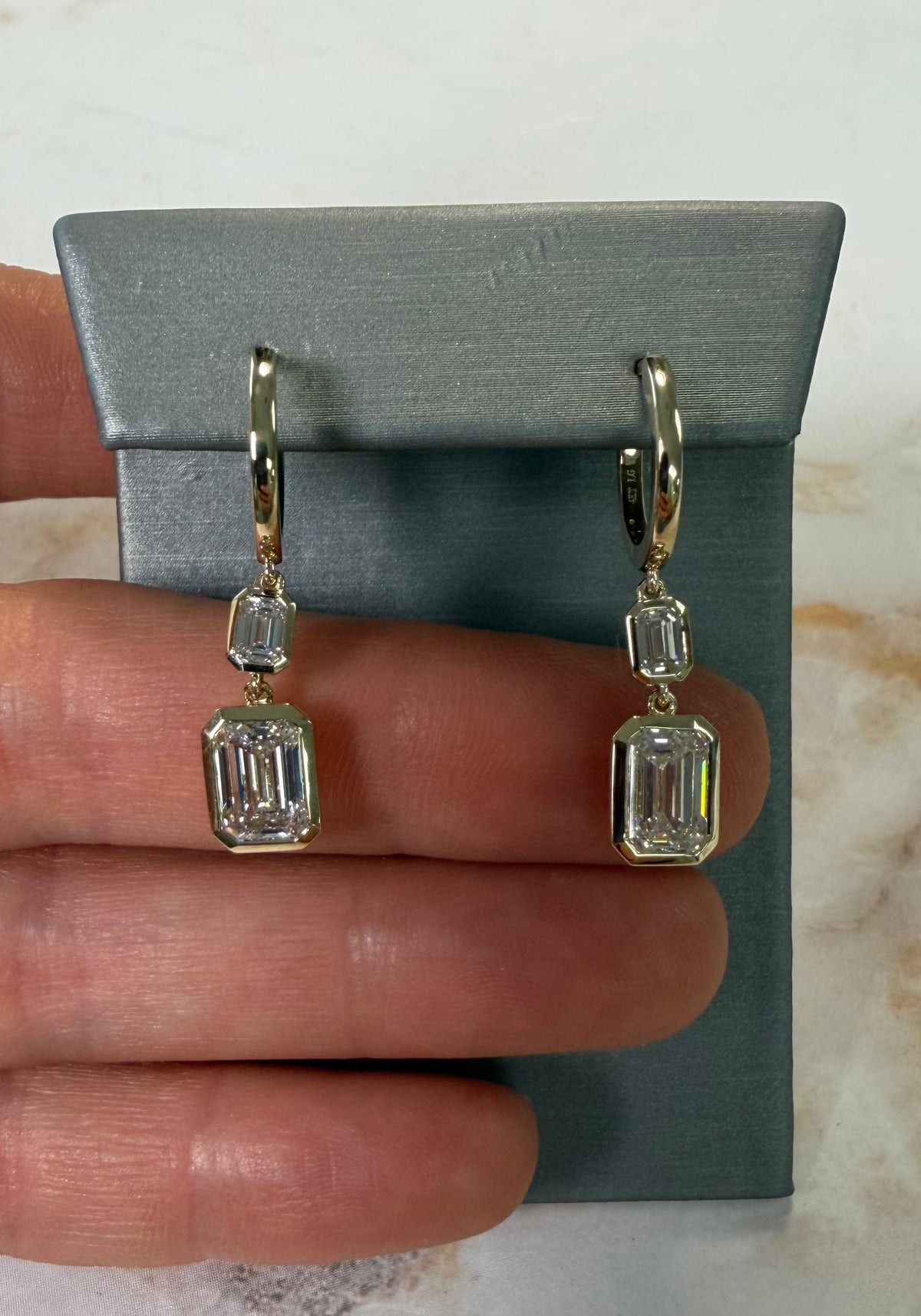4 cttw yellow gold emerald bezel hanging earrings