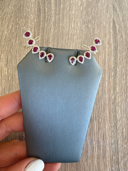 2.68 cttw ruby pear halo crawlers set in yellow gold