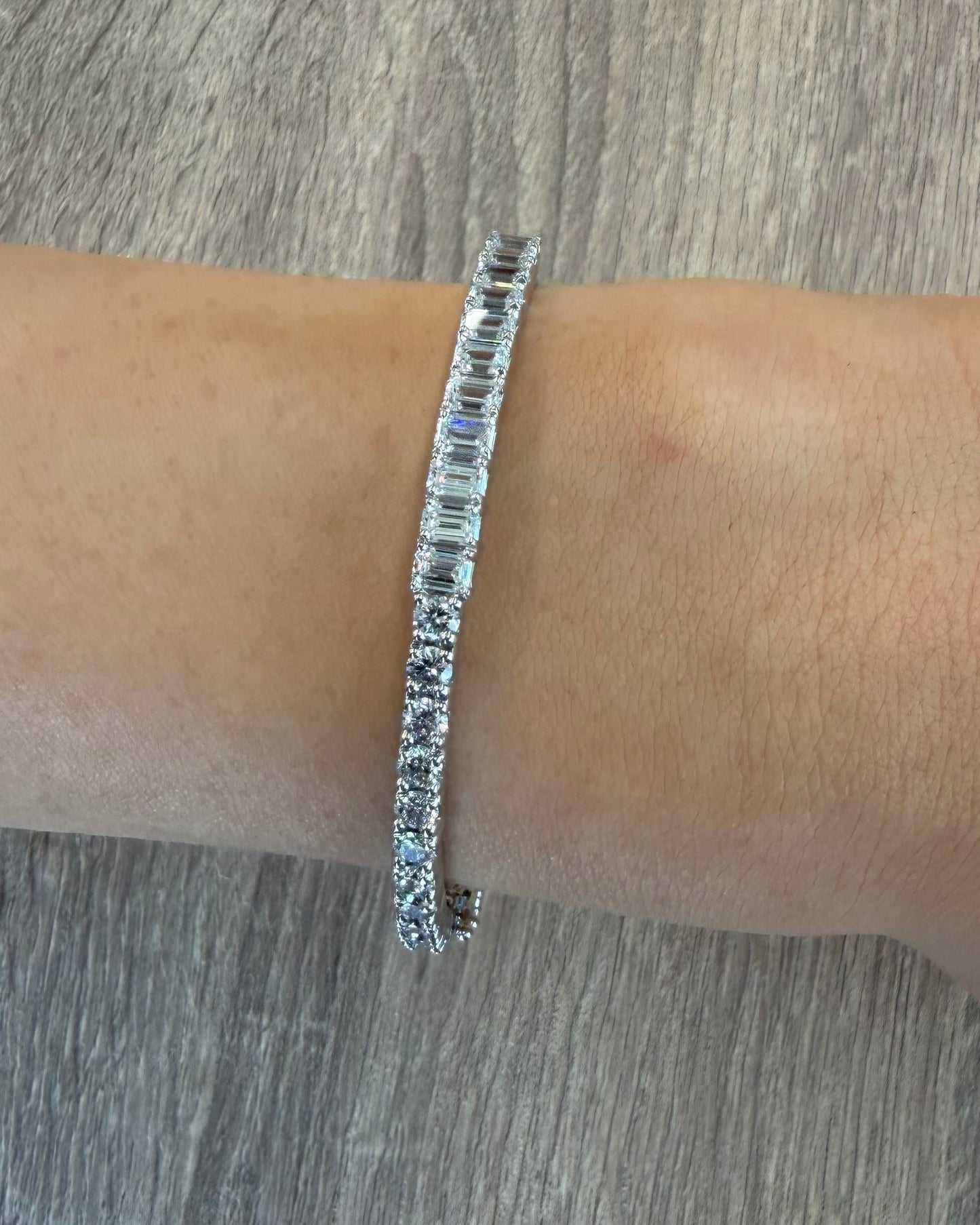 3.93 round & emerald undecided bangle