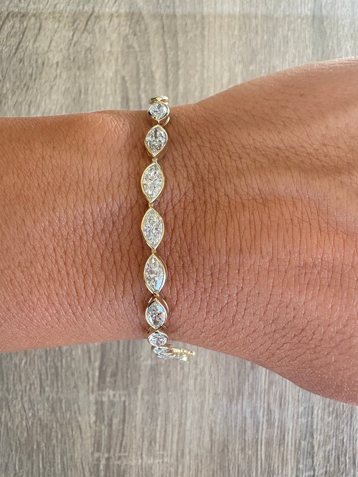 6.82 cttw East West bezel marquis tennis bracelet
