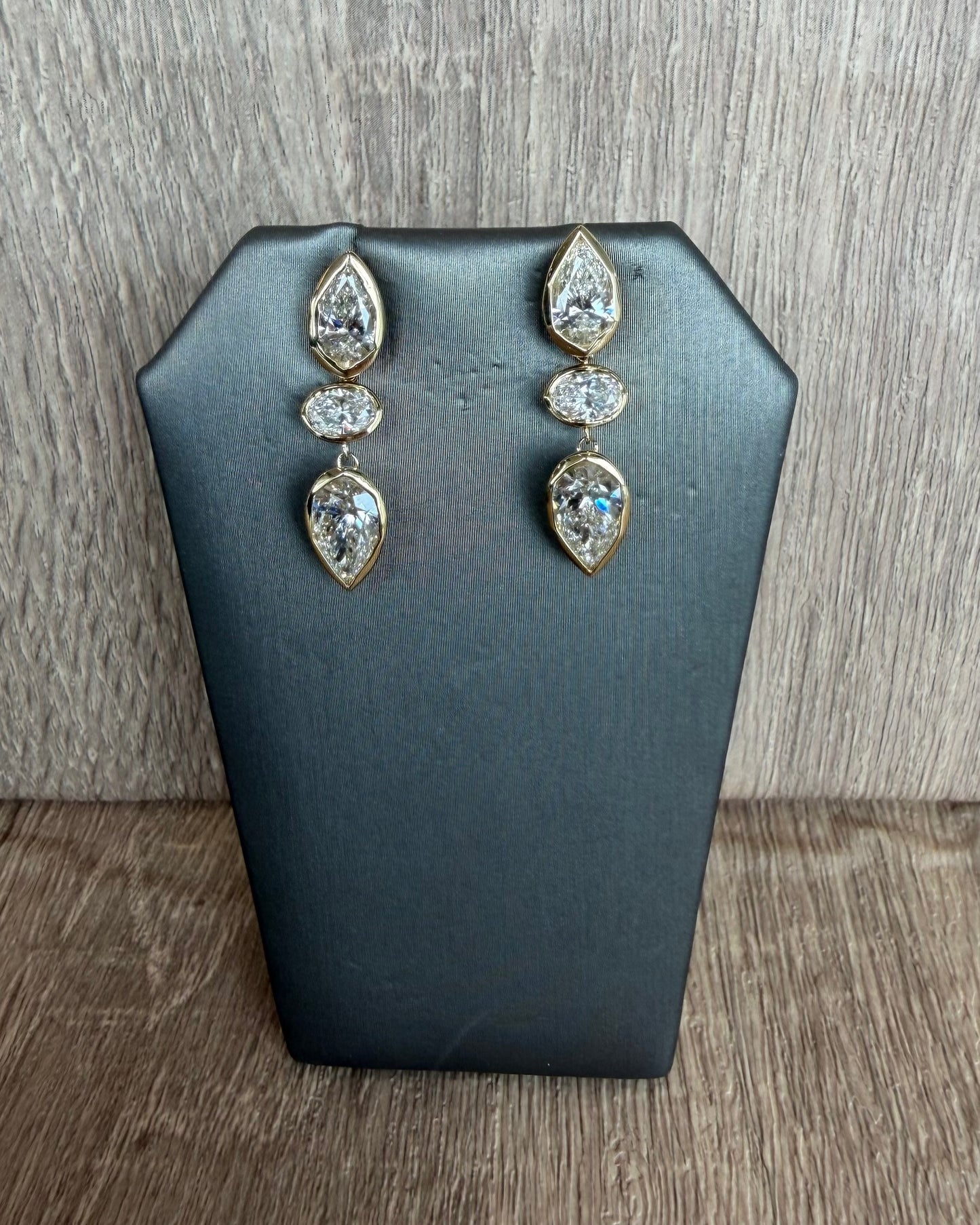 6.31 cttw bezel pear oval pear earrings