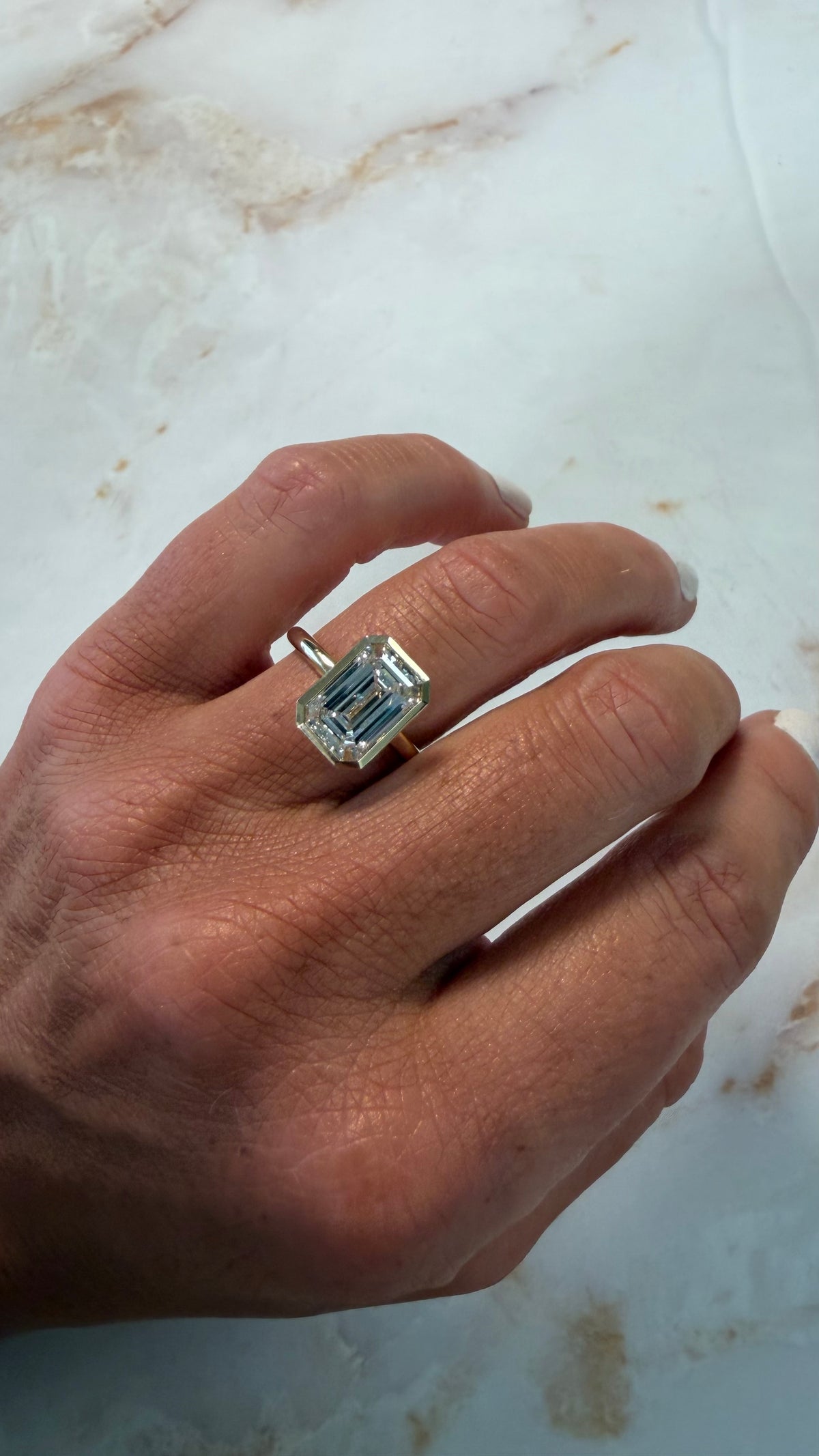3.2 ct bezel emerald engagement ring