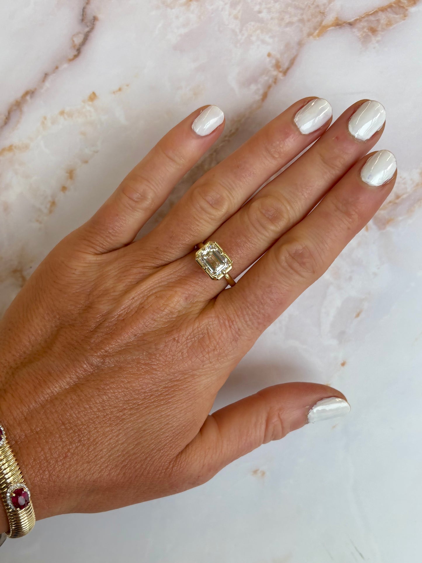 3 ct east west bezel emerald ring
