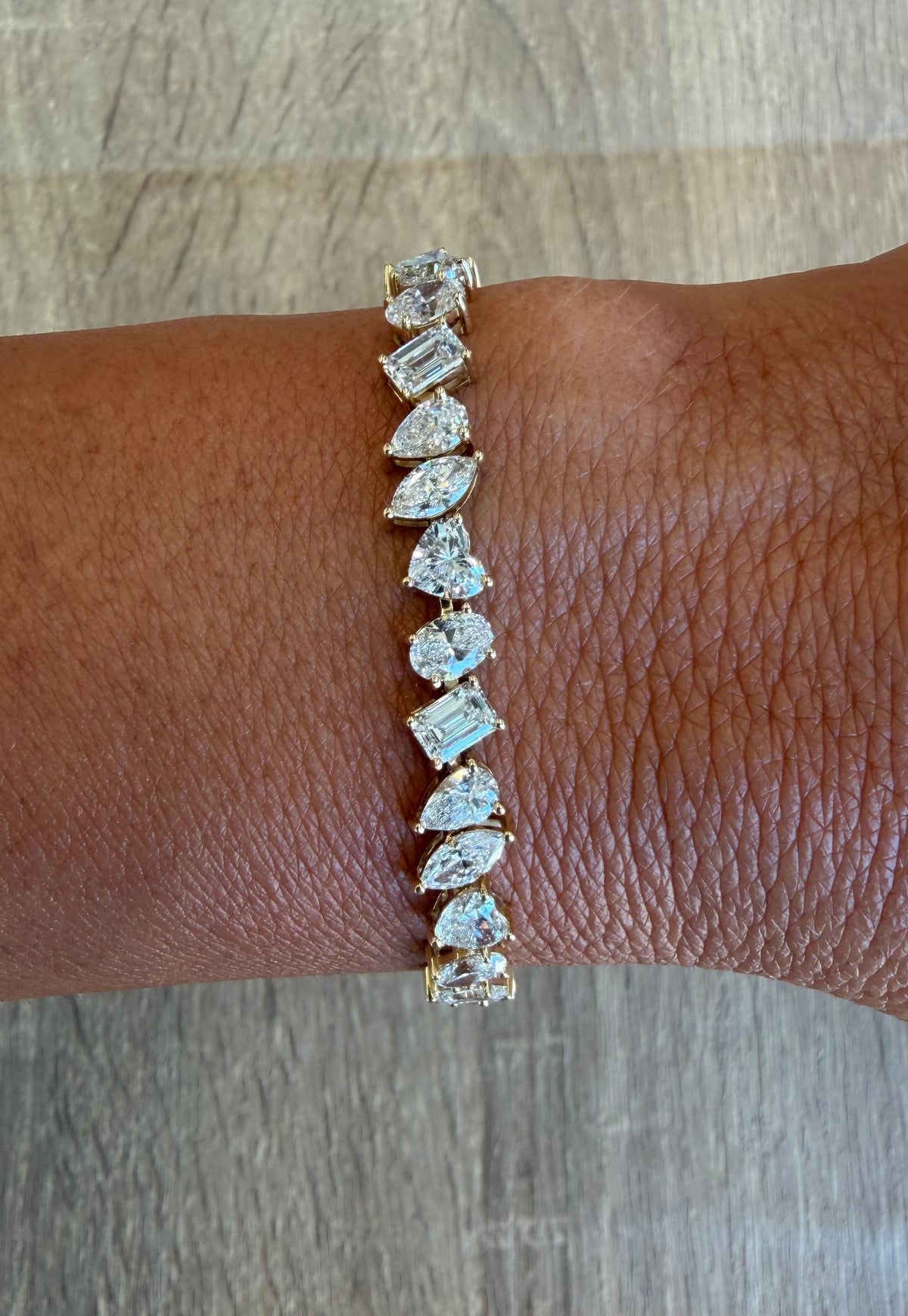 12.87 cttw yellow gold multi shape bracelet