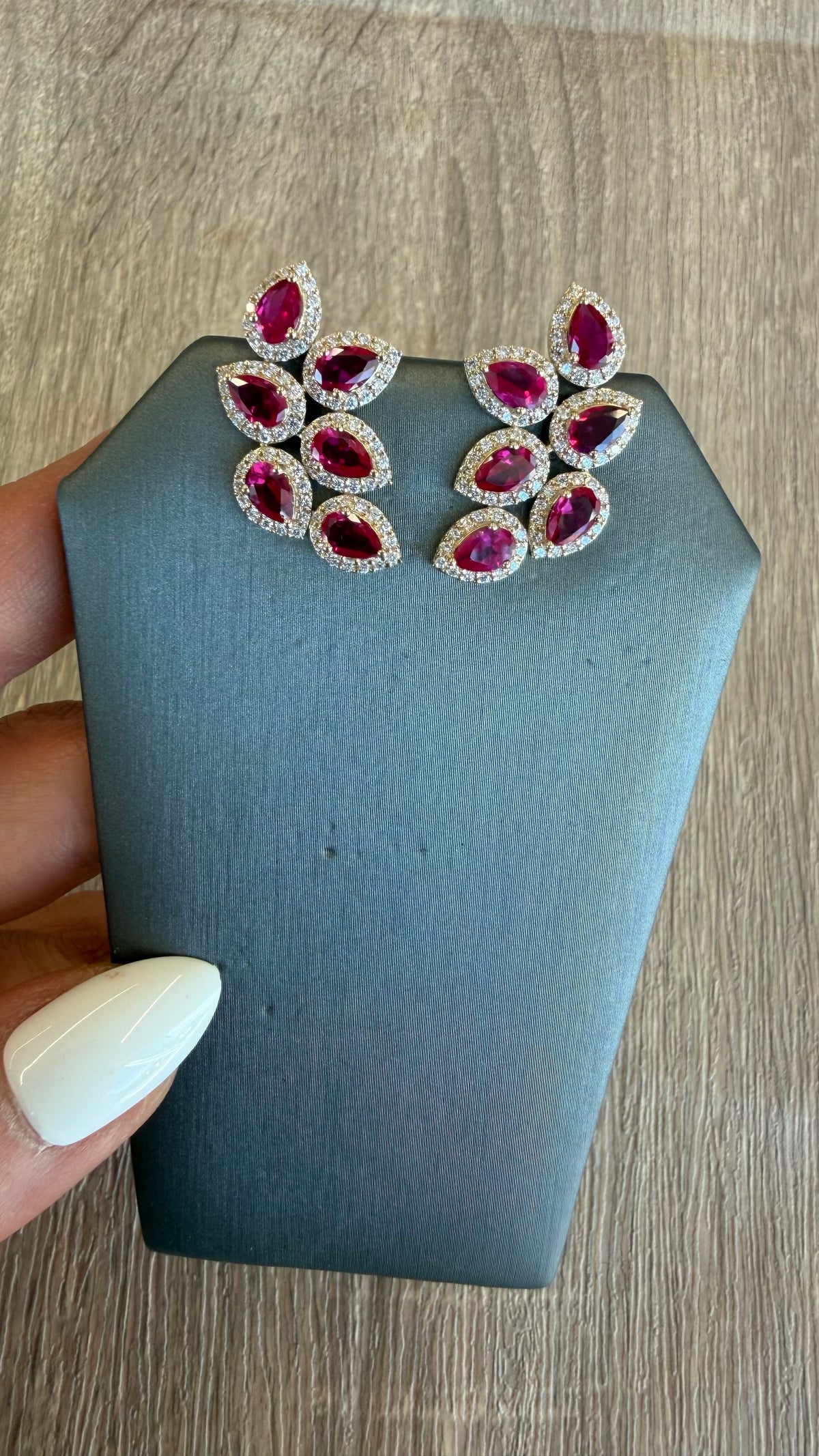 .95 cttw yellow gold ruby pears with halo cluster earrings