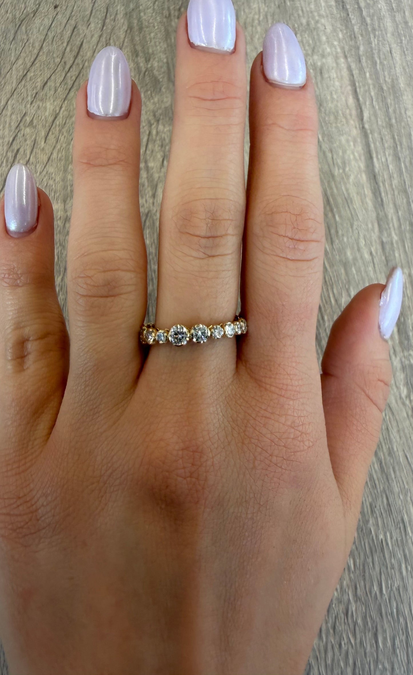 2 cttw graduated yellow gold round eternity band