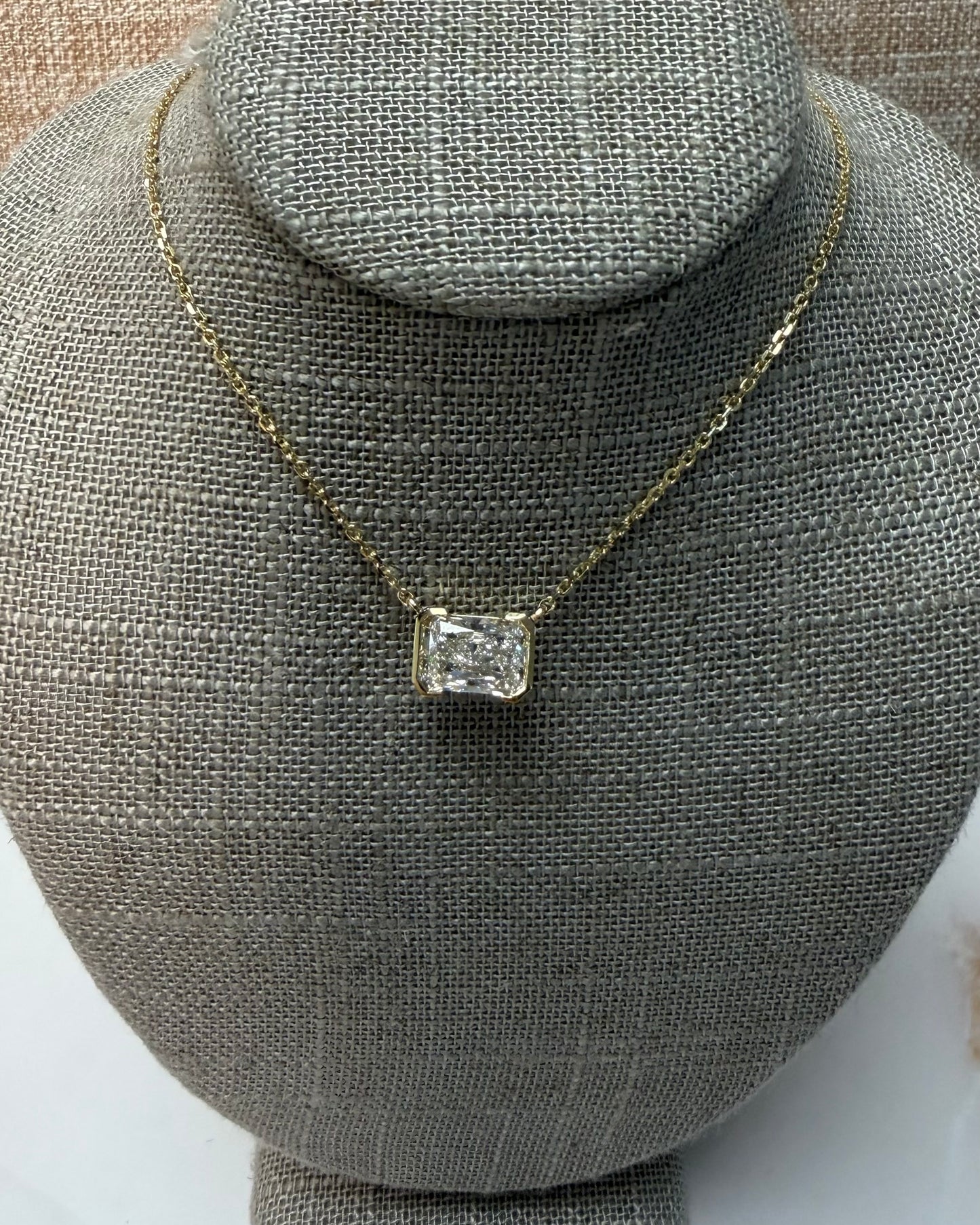 2 ct half bezel east west radiant necklace