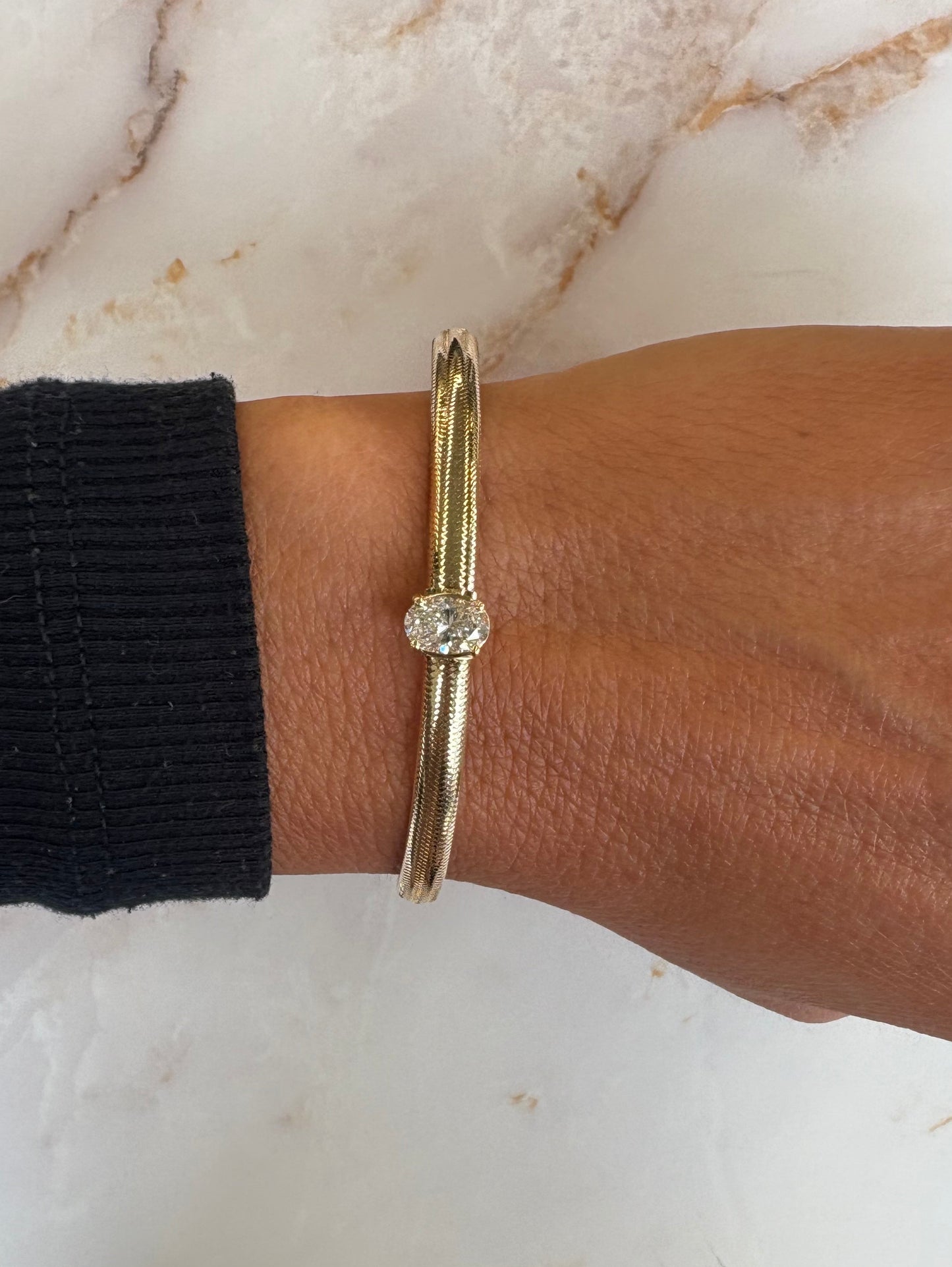 1 ct oval on yellow gold flex bangle
