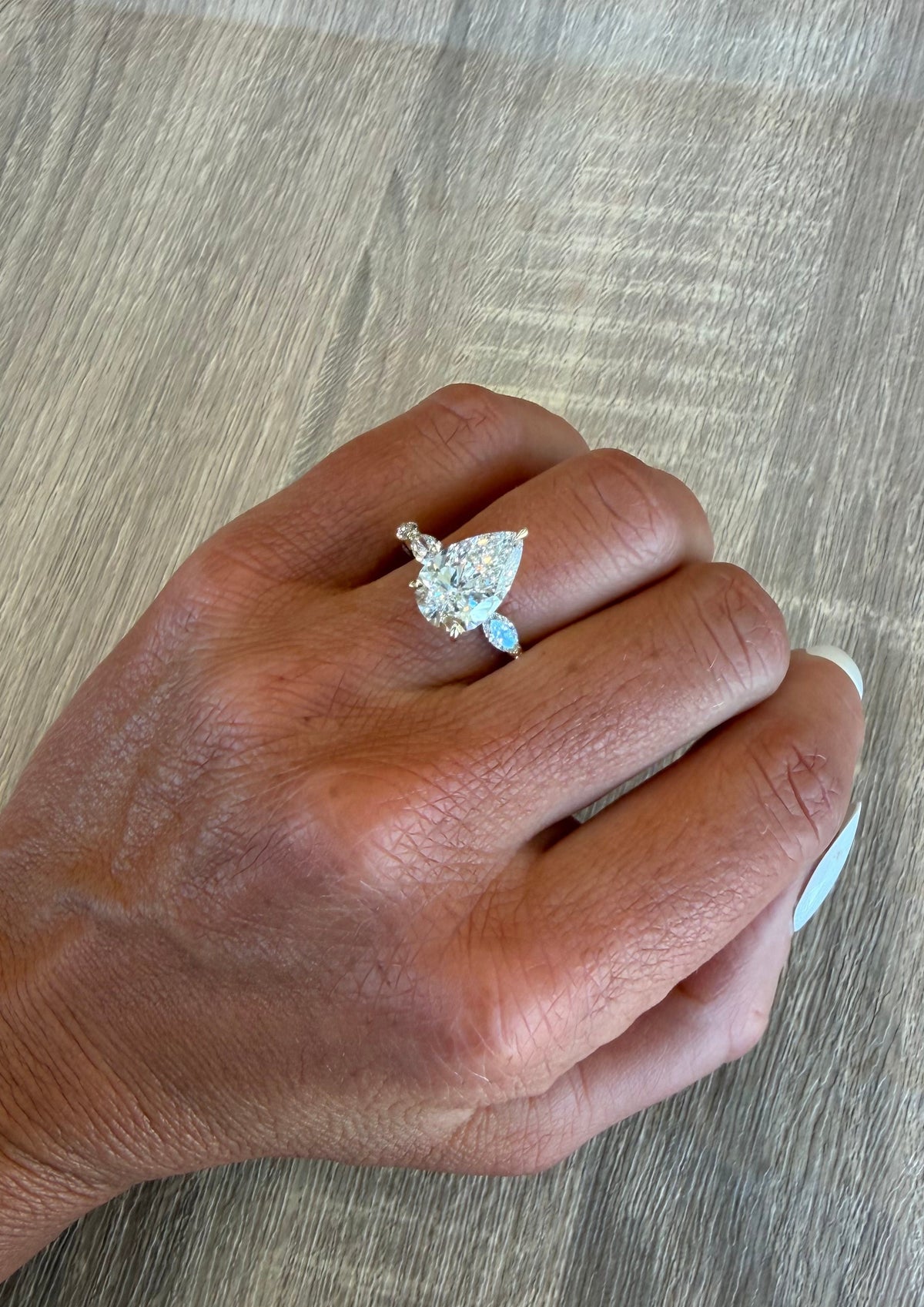 3.65 cttw yellow gold pear engagement ring with ovals in band