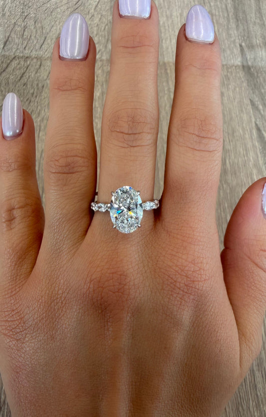 4.34 cttw oval on pave band