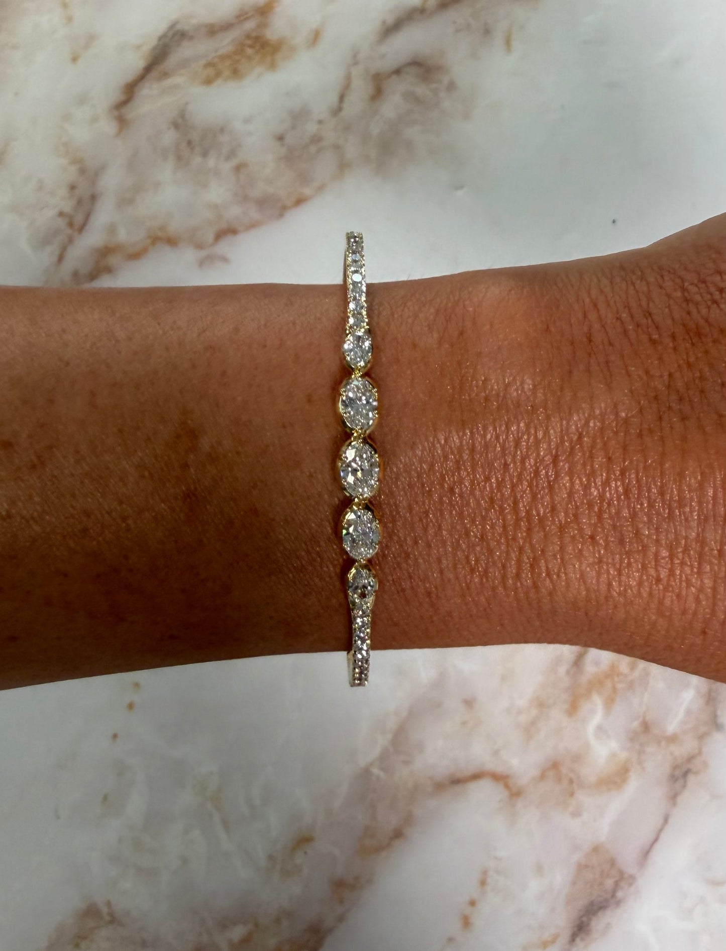 2.5 cttw graduated diamond bangle with east west ovals