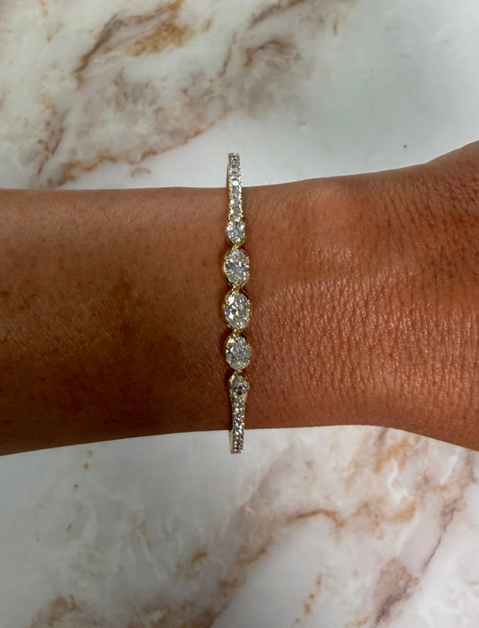 2.5 cttw graduated diamond bangle with east west ovals
