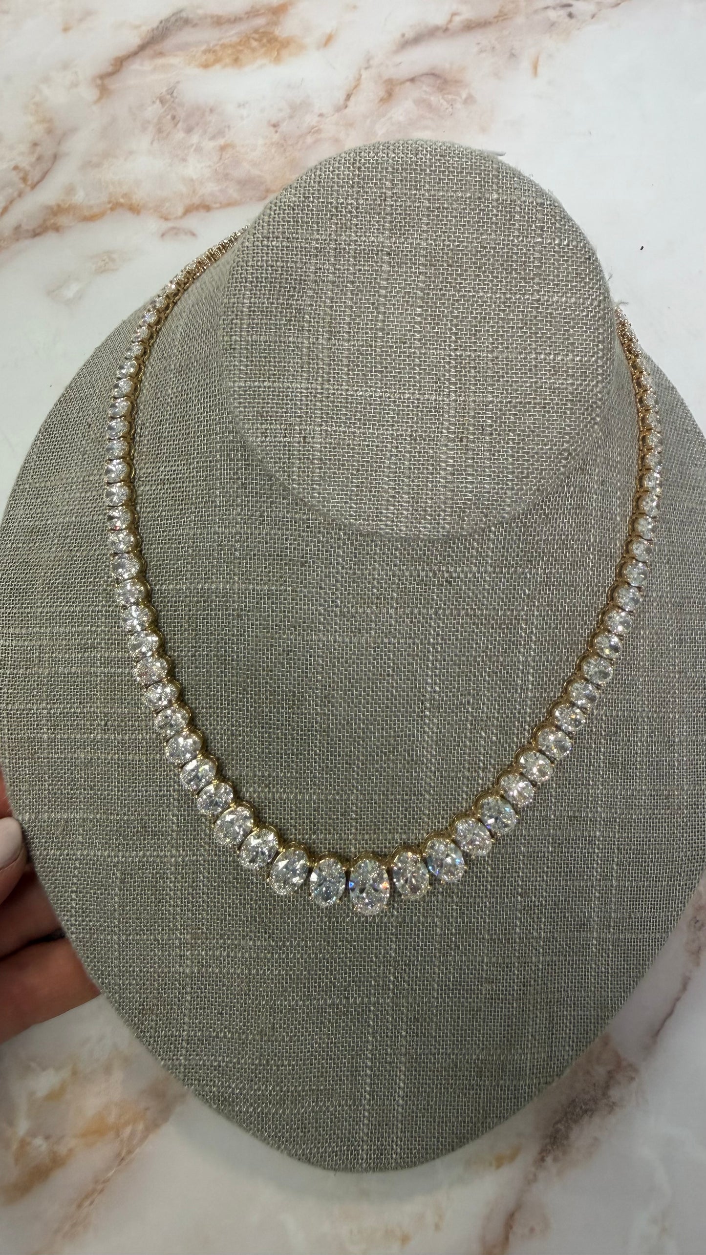 51.89 cttw graduated yellow gold oval tennis necklace