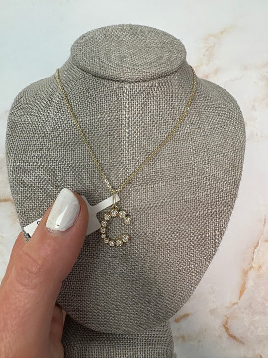 .33 cttw bezel C charm (no chain)