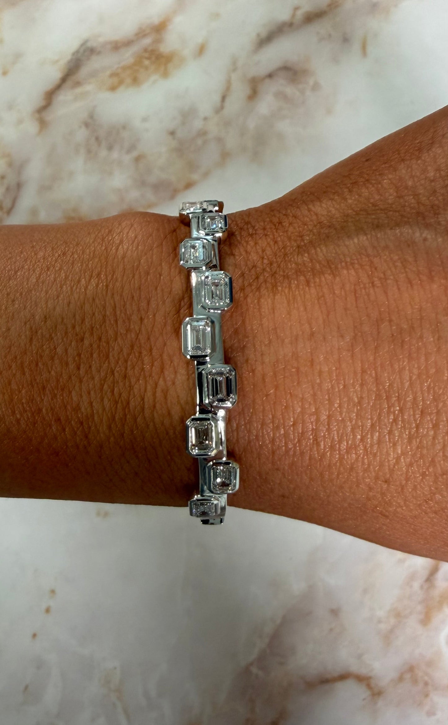 5.85 cttw white gold asymmetric emerald bezel bangle