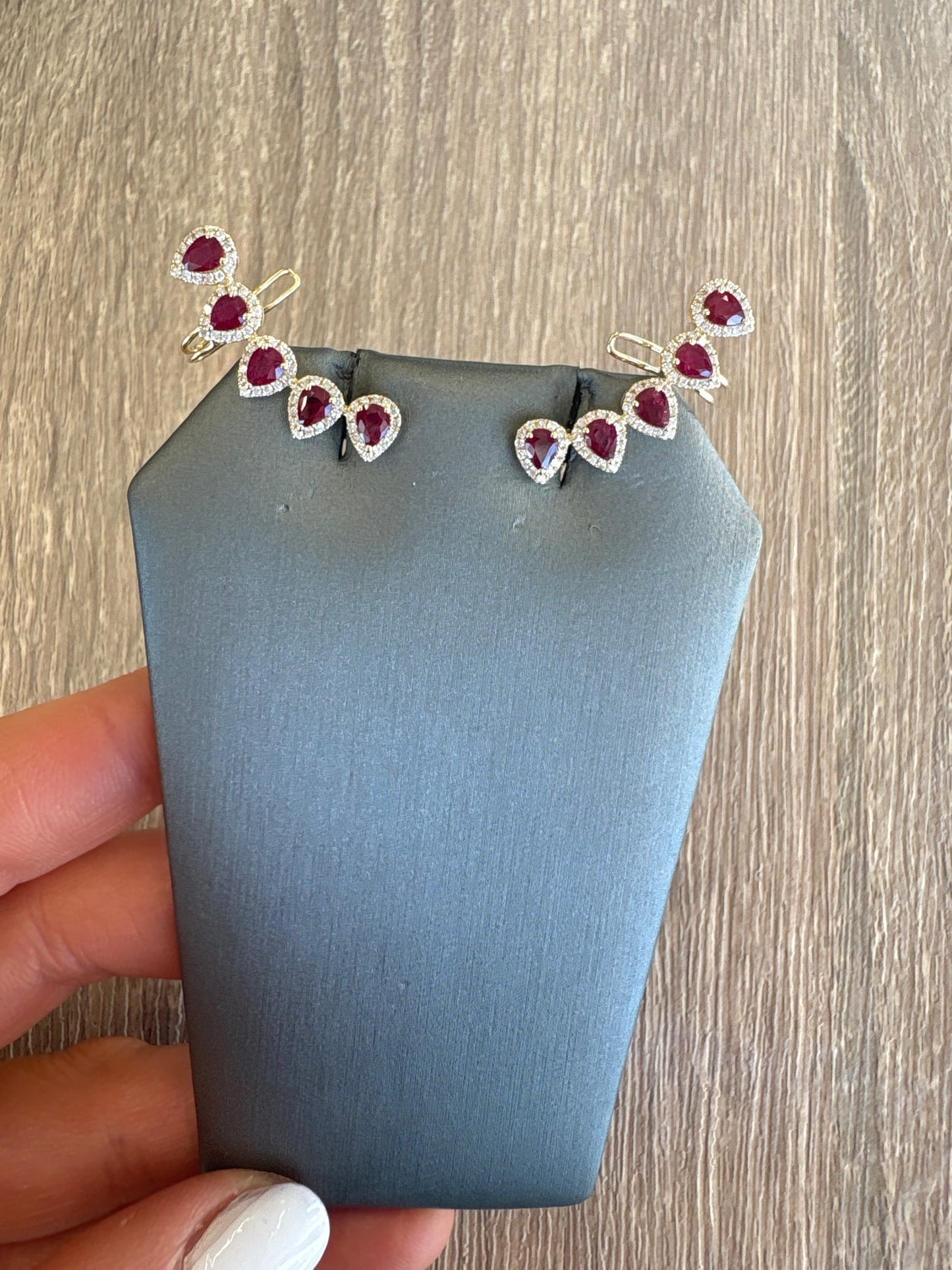 2.68 cttw ruby pear halo crawlers set in yellow gold