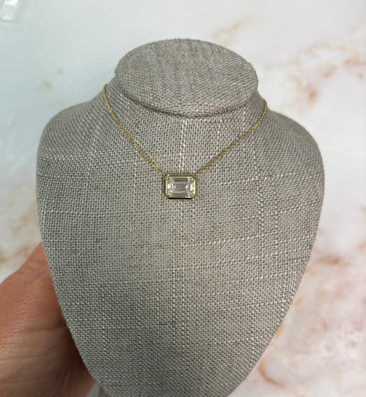 2 ct east west bezel emerald solitaire necklace