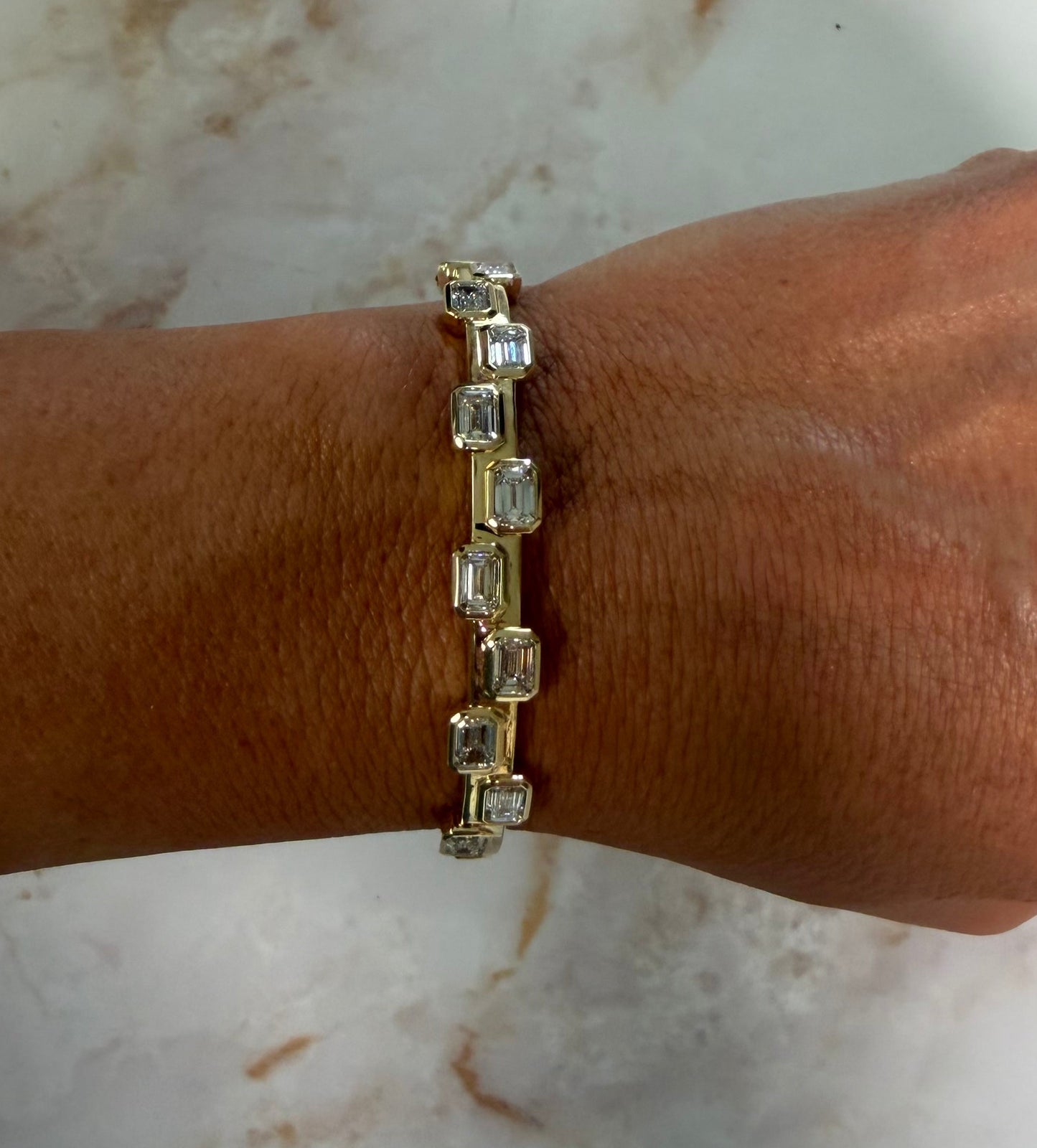 5.85 cttw asymmetric bezel emerald bangle