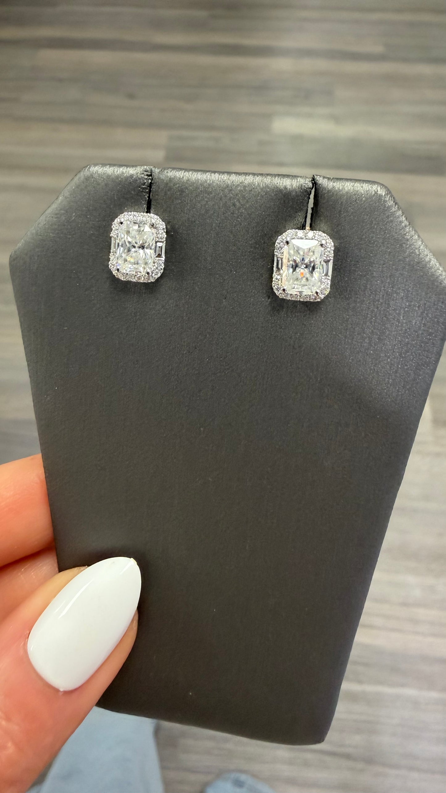 1.78 cttw radiant studs with round and baguette halo