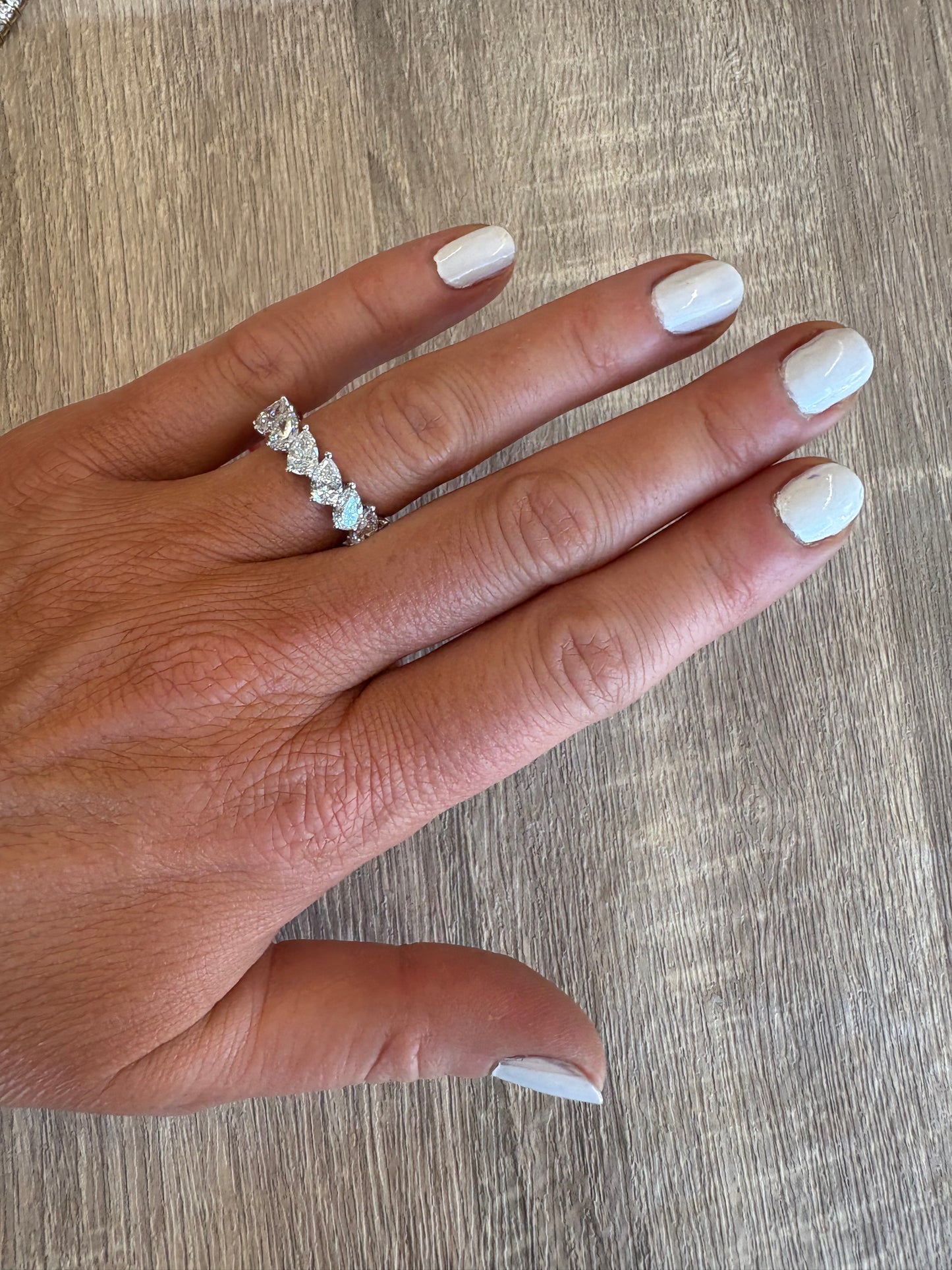 5.77 cttw slanted pear eternity band