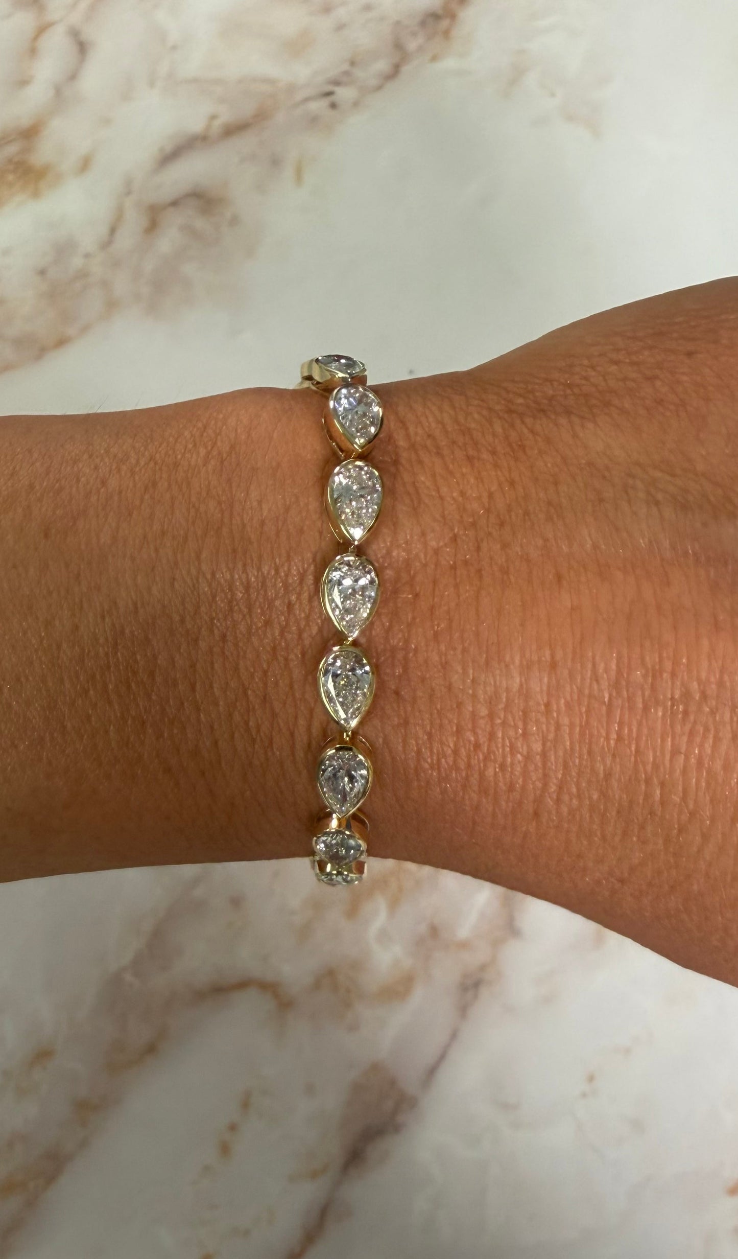 12.85 cttw east west bezel pear bracelet