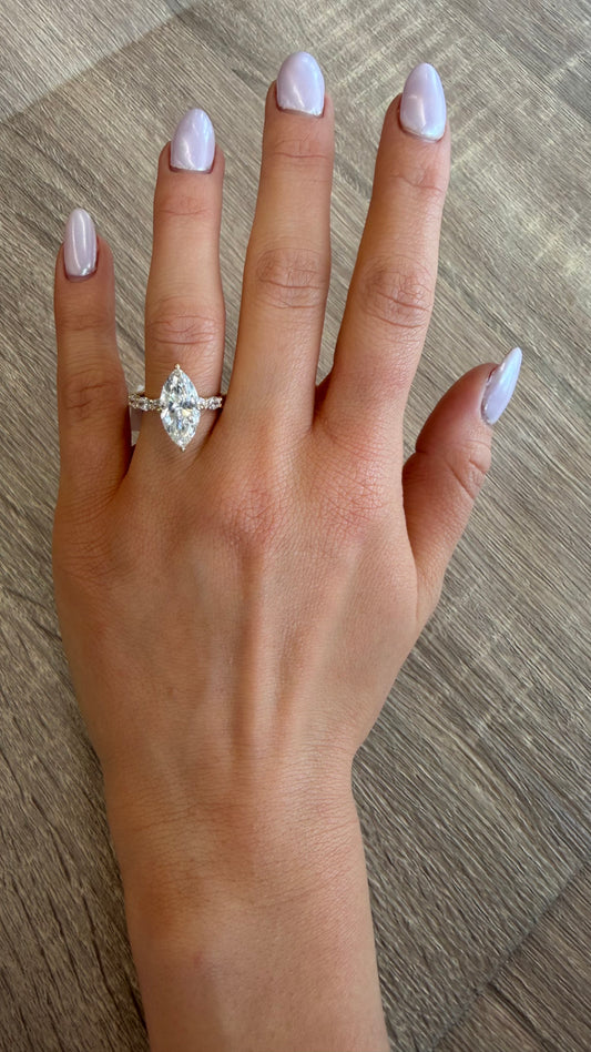 3.83 cttw marquis on yellow gold band with diamonds