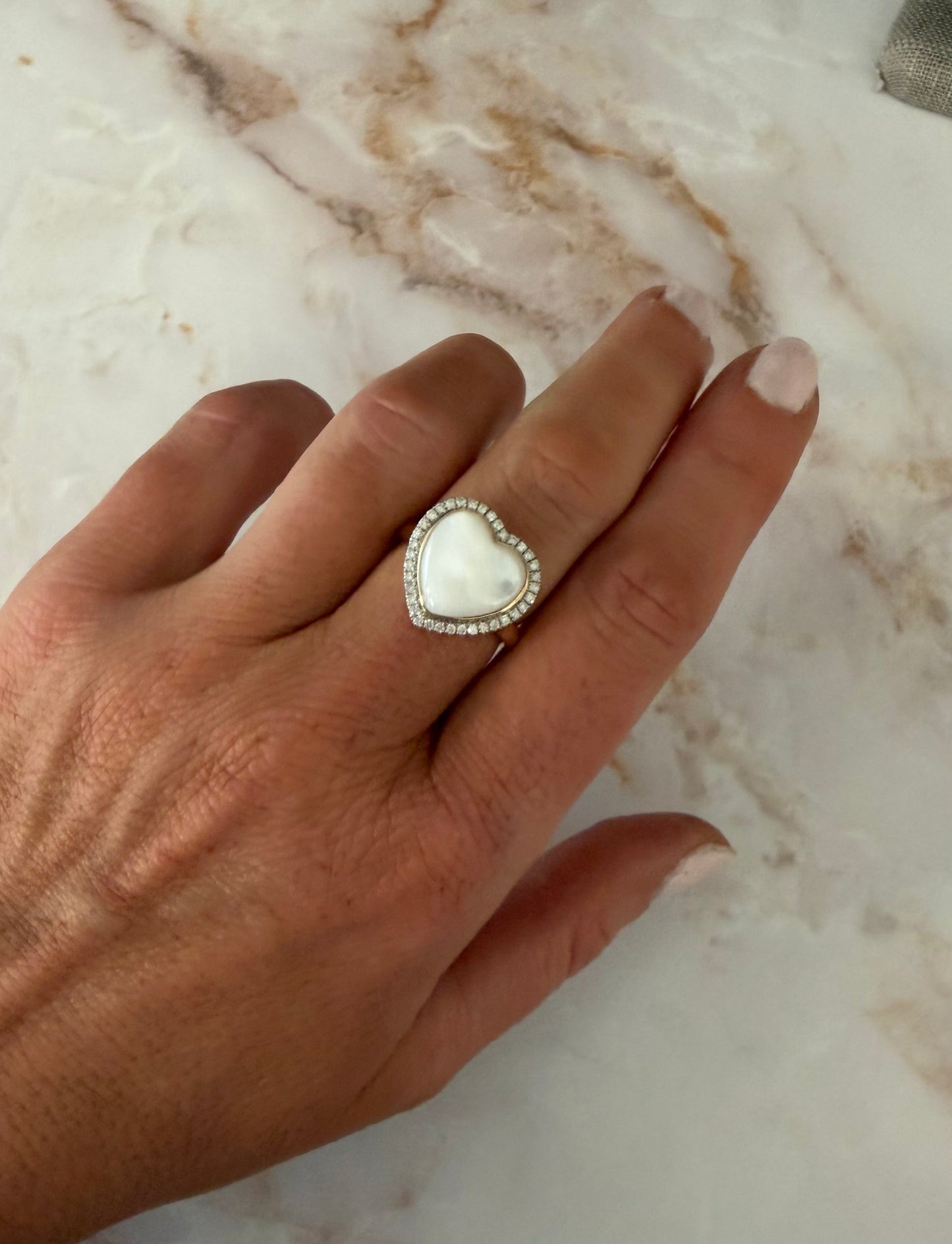 3.6 ct pearl heart with .35 cttw halo ring