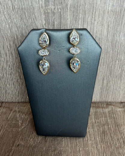 6.31 cttw bezel pear oval pear earrings