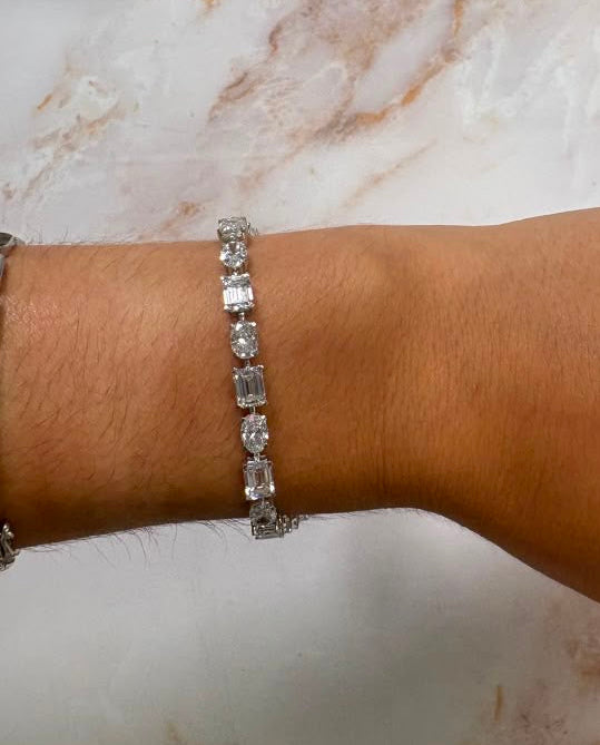 13.8 cttw east west oval + emerald tennis bracelet