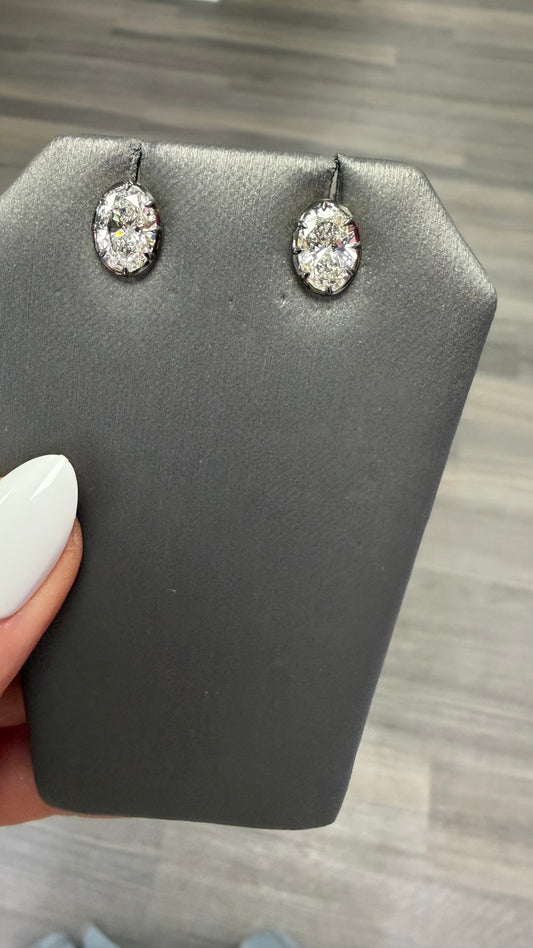 3 cttw oval studs set in black rhodium