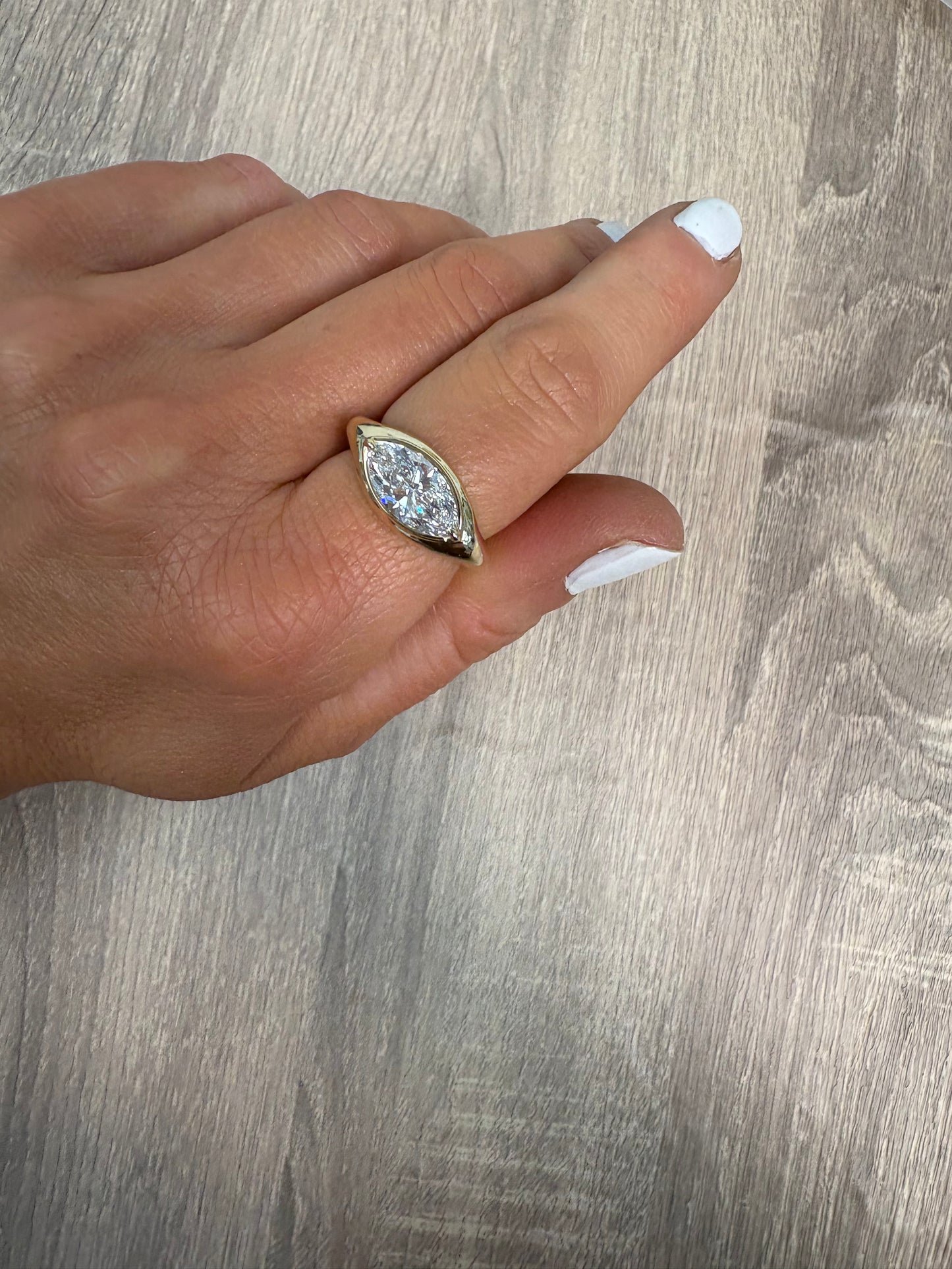 2 ct East West Bezel Marquis Ring