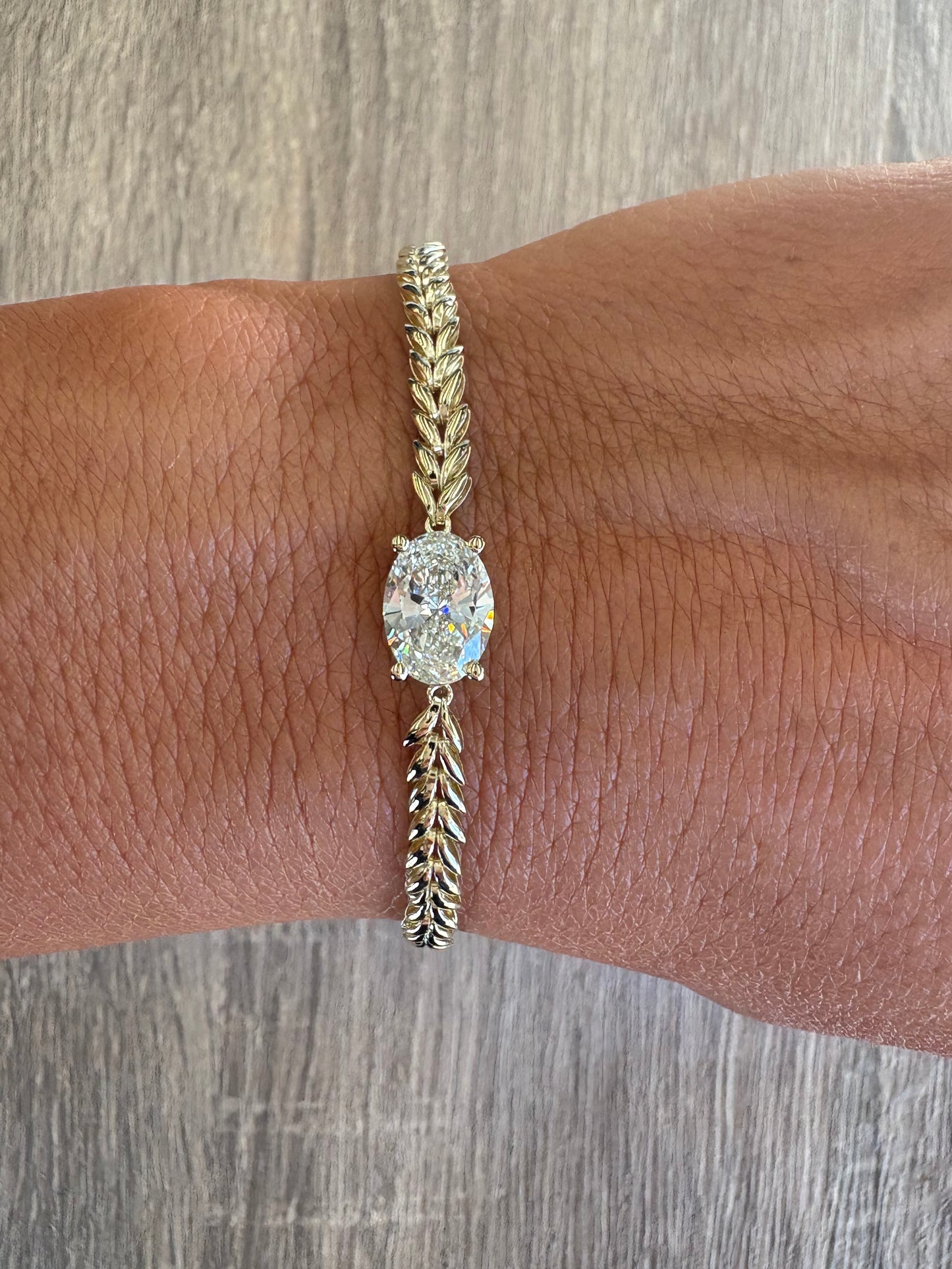 2 ct oval stone on herringbone Cuban chain