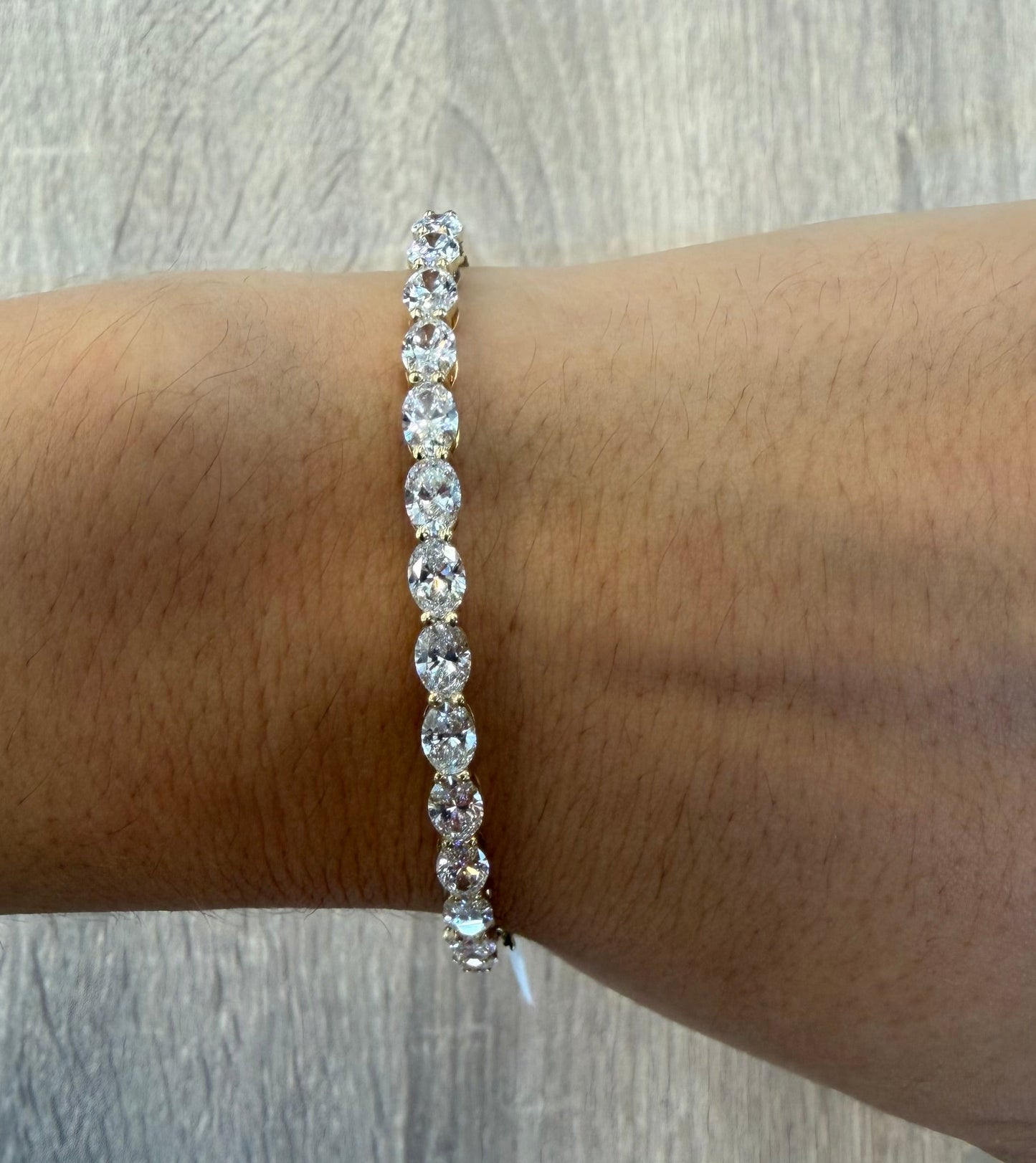 4.39 cttw east west oval yellow gold bangle