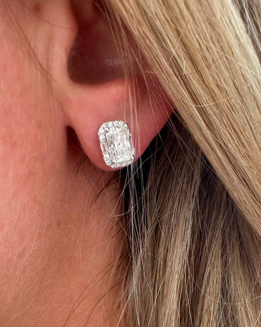 1.78 cttw radiant studs with round and baguette halo