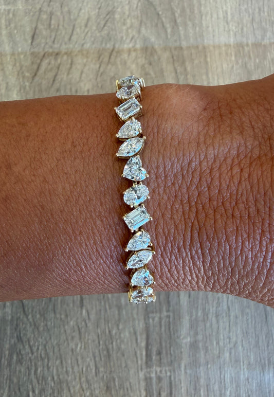 12.87 cttw yellow gold multi shape bracelet