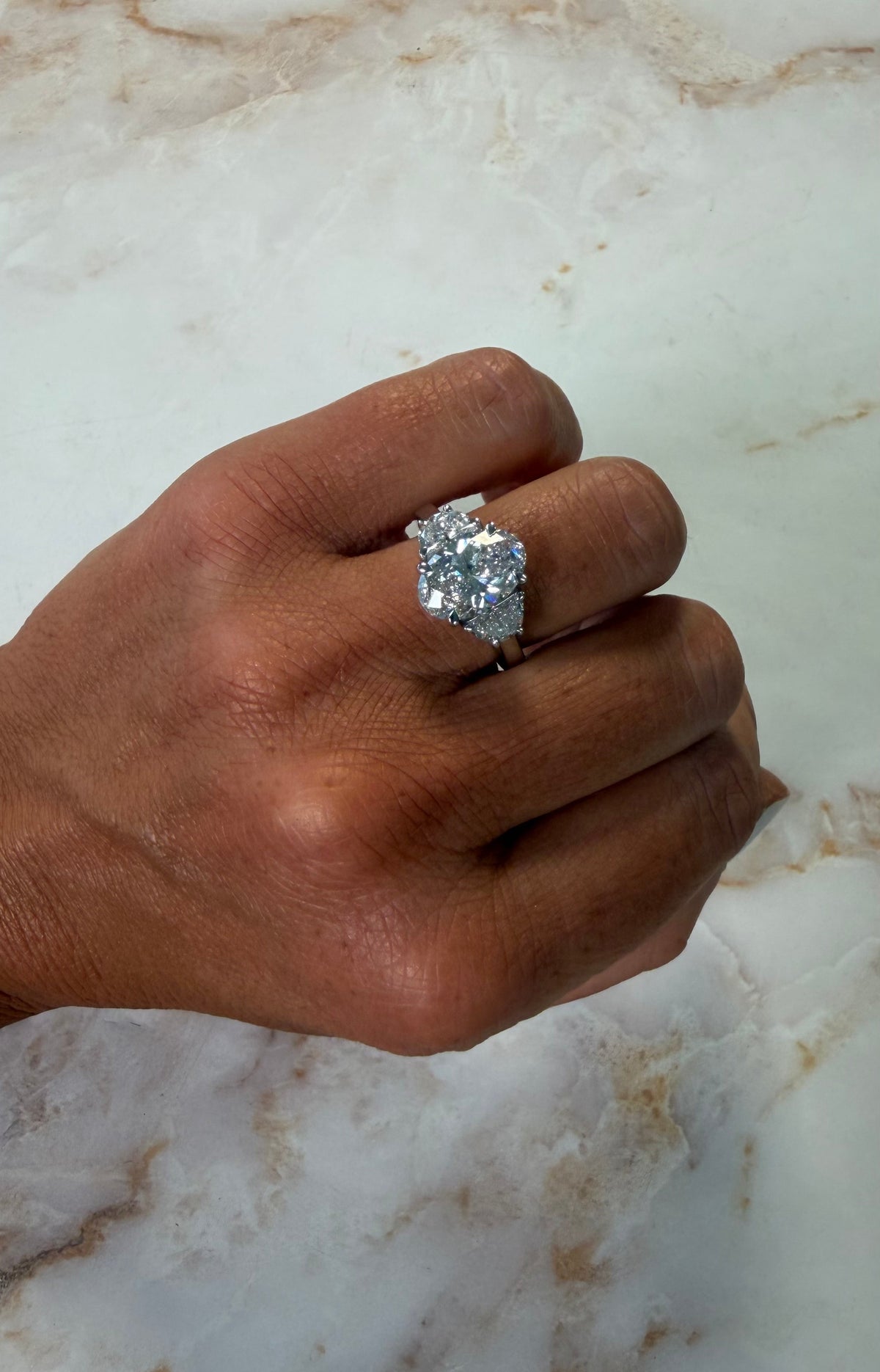 3.91 cttw oval engagement ring with half moon side stones