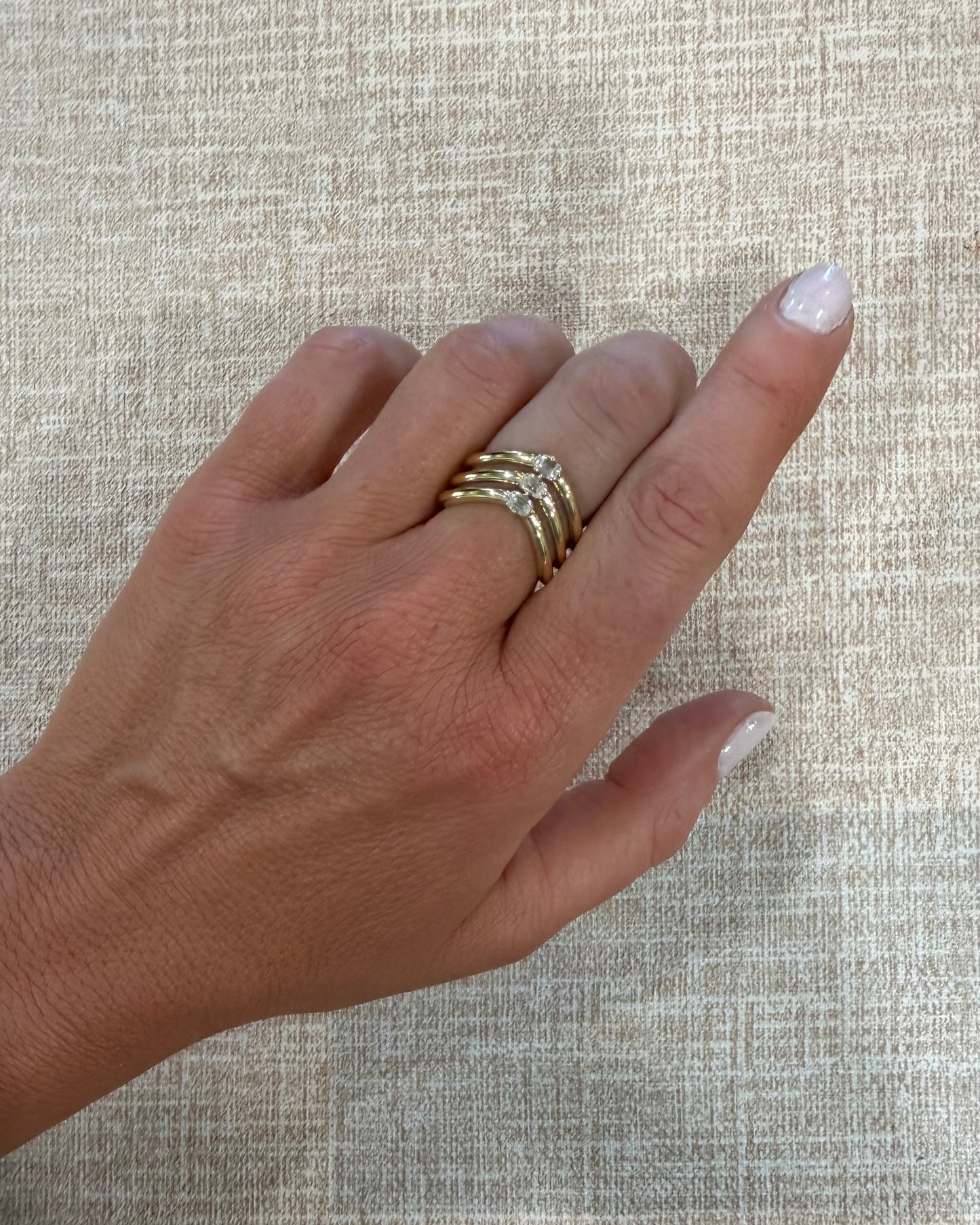 .42 cttw gold triple V band with emerald centers