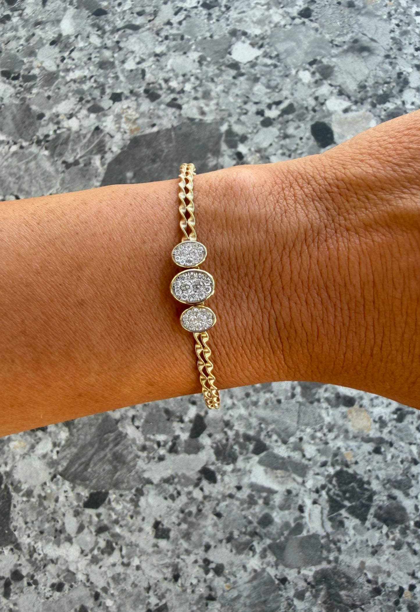 .5 cttw 3 natural diamond pave bezel ovals on twisted gold bangle