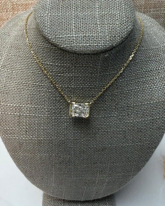2 ct half bezel east west radiant necklace
