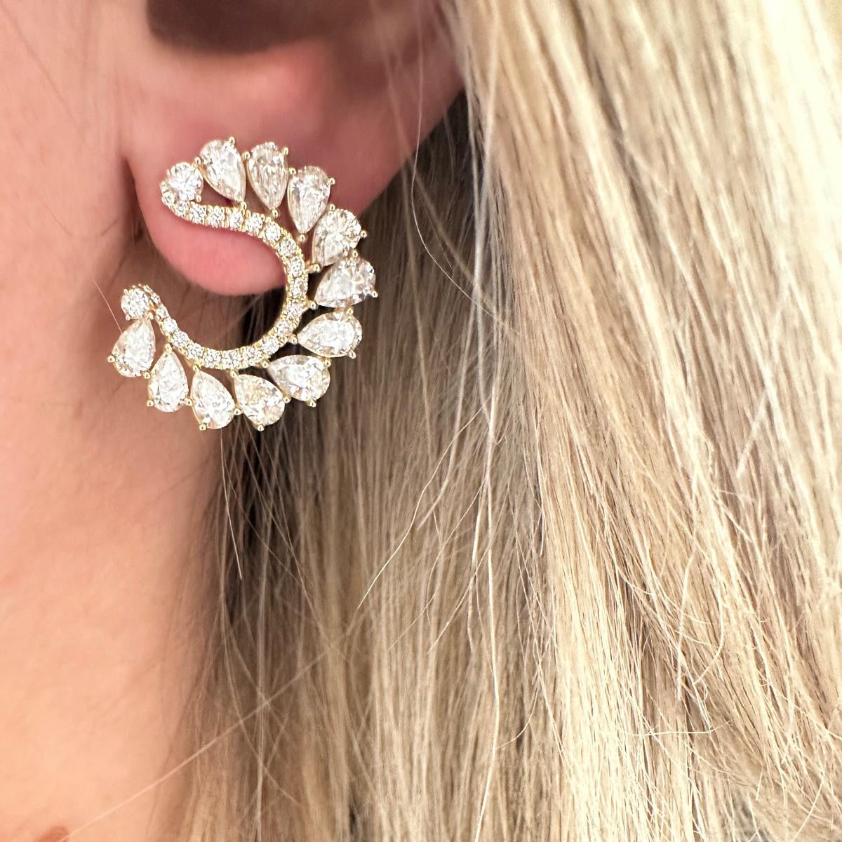 Yellow gold pear front facing hoops